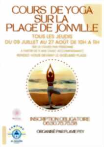 photo Cours de yoga à la plage